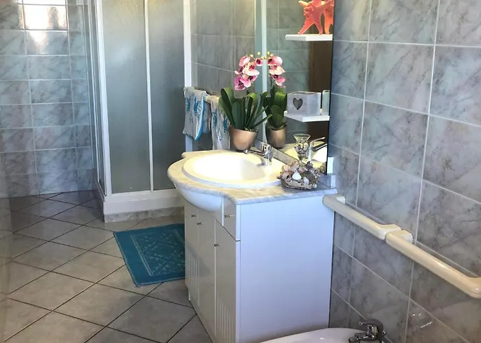 Apartman Andrea Frau - Casa Mandorleto New - Sardinia Villasimius-peaceful Panoramic Terrace-full Comfort Air Conditioning-wifi-parking-privacy Villasimius